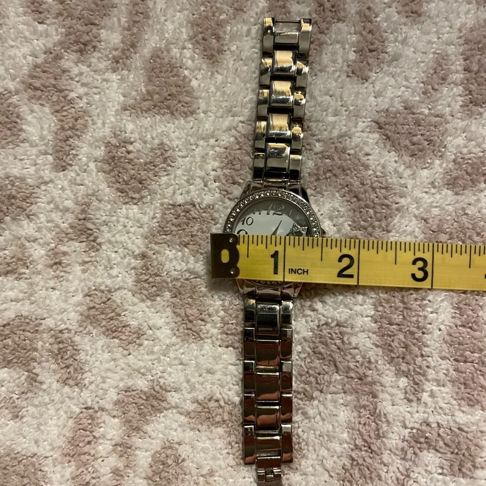 VGC Vintage AVON Floating Charms Silver tone Wristwatch. - Picture 10 of 16